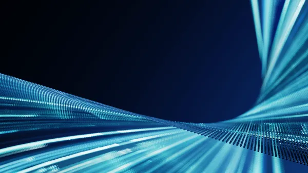 a graphic with a wave of lights and lines in blue against a dark background