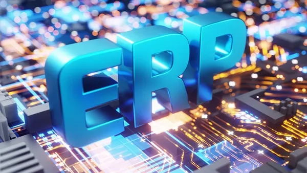Large blue “ERP” letters positioned on a glowing digital circuit board, representing enterprise resource planning systems, interconnected business applications, data integration, and modern enterprise technology infrastructure.