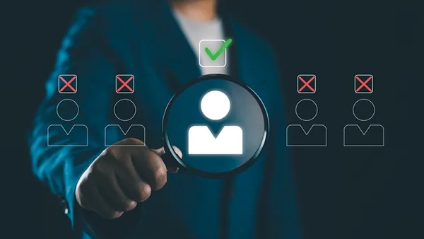 Businessman searching for candidates for recruitment with a virtual interface, showing the HR decision process, hiring strategy, talent selection, and digital human resource management for workforce optimization.